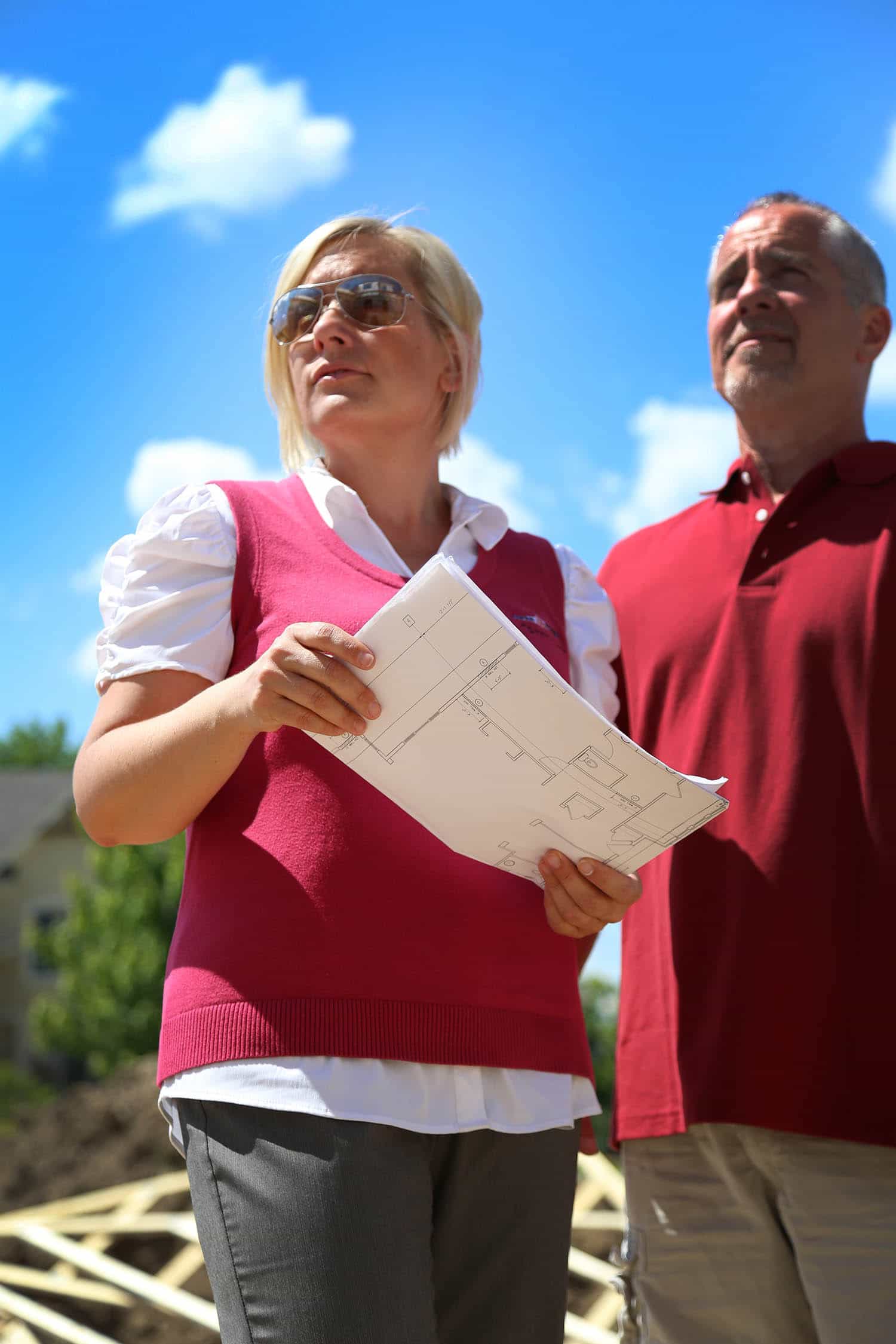 Shelly Basso looking at floorplans for new home
